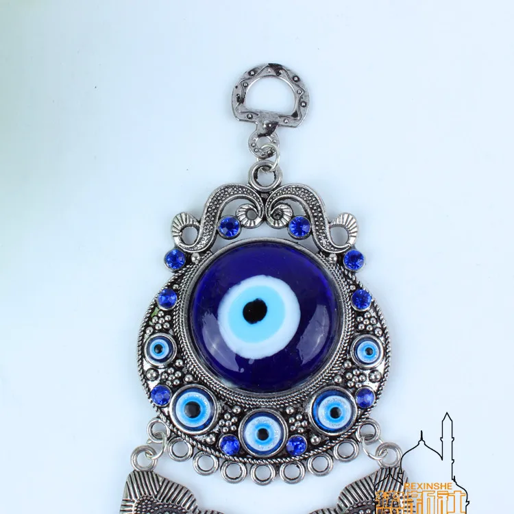 Turkey blue diamond eyes small palm Muslim peace metal pendant Jushi evil house wall hangings