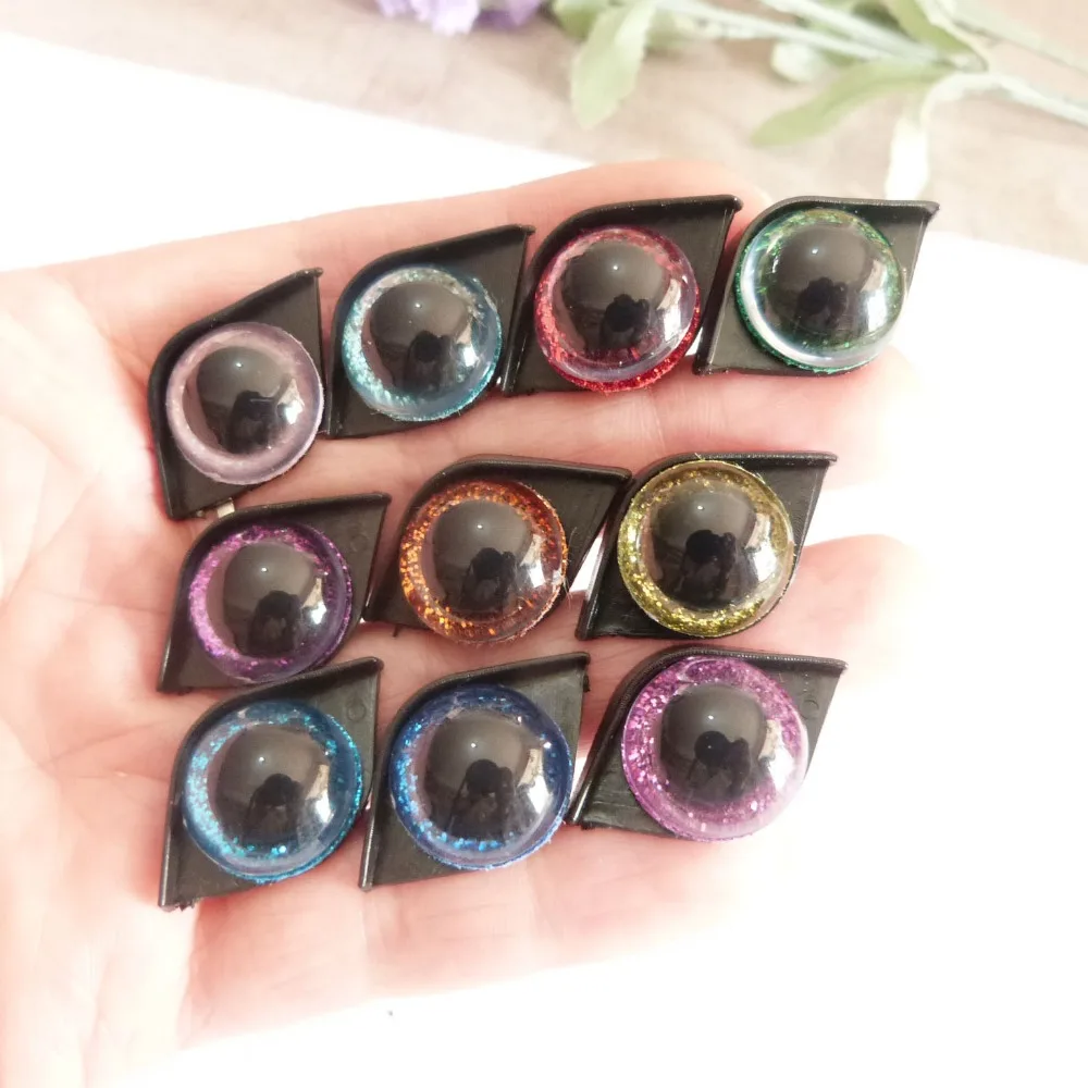 

20set/lot 16mm round shape plastic clear safety toy eyes +glitter Nonwovens + hard washer+black single eyelid--color option