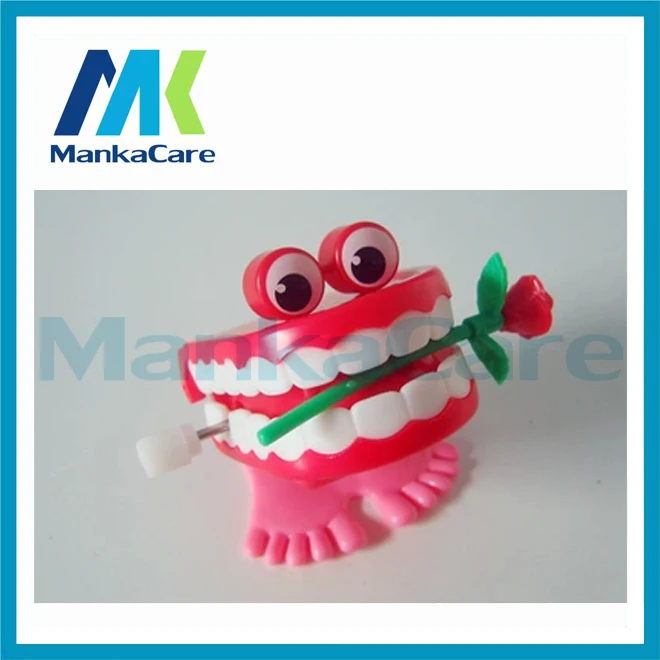 

20 Pcs Spring Wind-up Jump Tooth Dental Toys Creative Dental Wind-up Gift Lovely Spring Plastic Toys Jump Teeth Chain for Childr