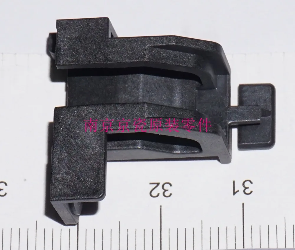 New Original Kyocera HOLDER PRESS CLAW for: TASKalfa 4002i 5002i 6002i 2552ci 3252ci 3552ci 4052ci 5052ci 6052ci