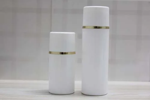 

50ml white airless vacuum pump lotion bottle with gold Line and white cap ,50 ml vacuum Cosmetic Container with gold line