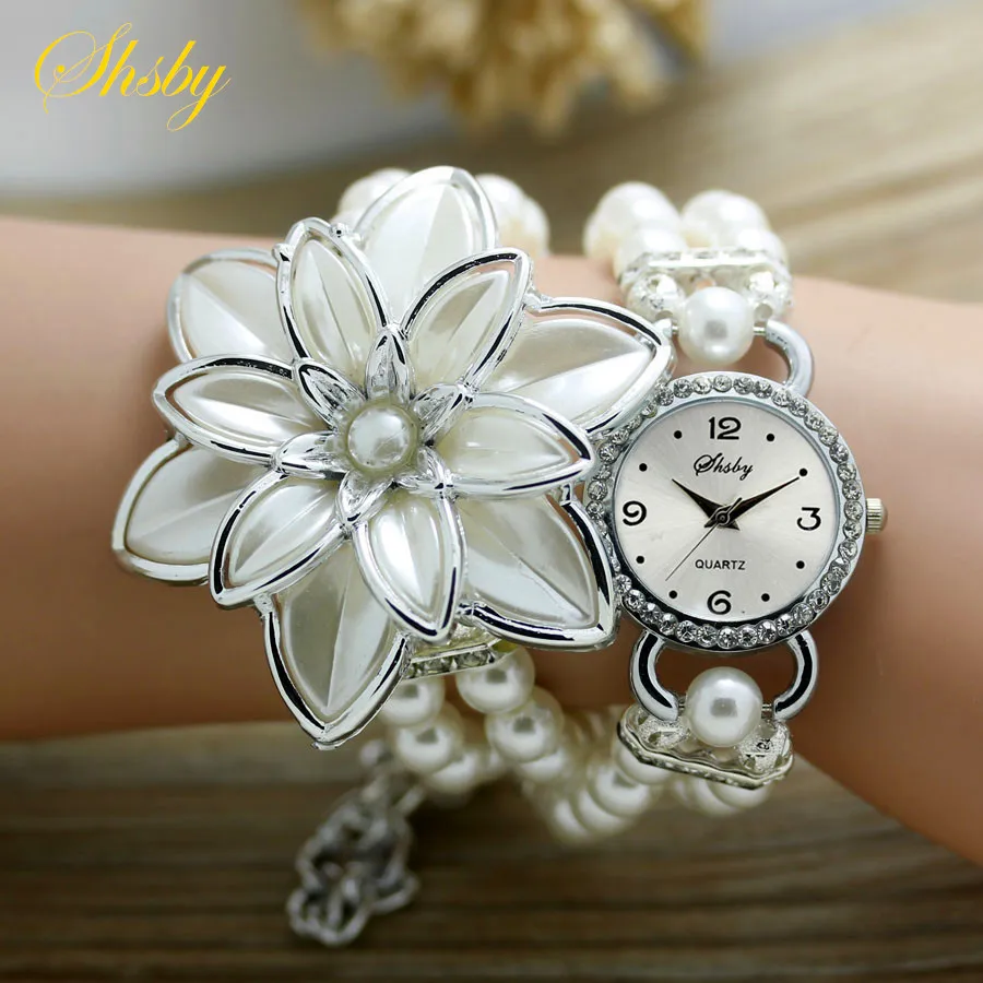 Shsby Fashion Women Rhinestone Watches  Ladies Pearl Strap Many Petals Flower Bracelet Quartz Wristwatches Women Dress Watches