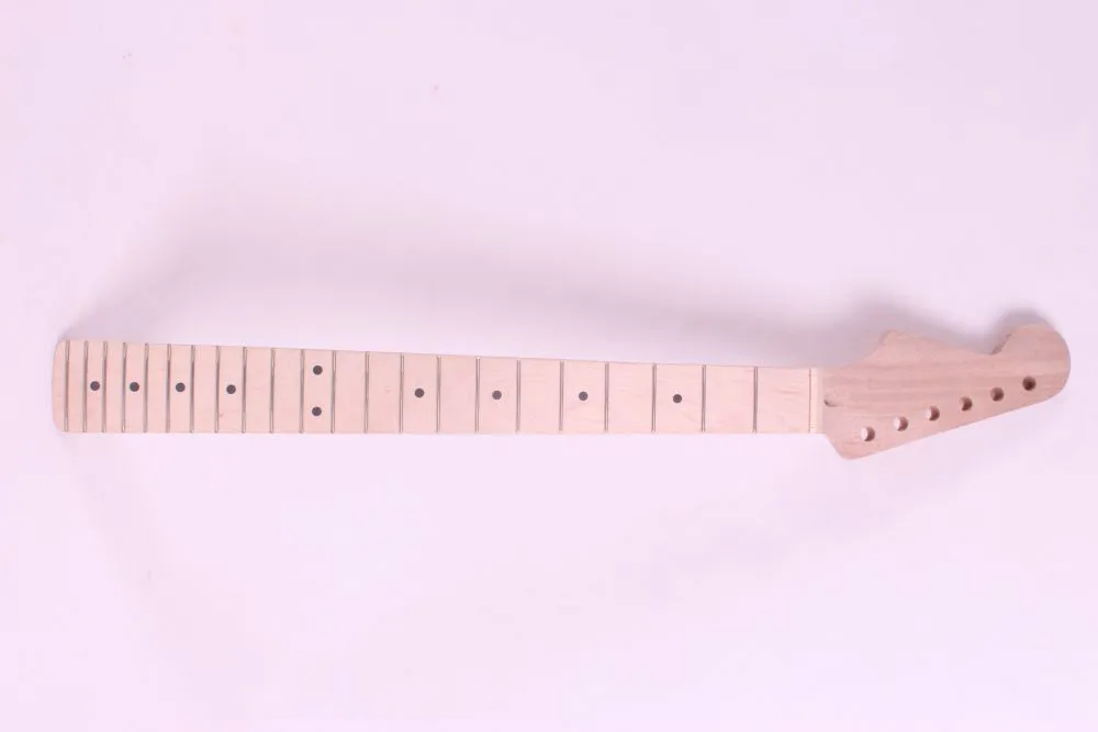 

one left unfinished electric guitar neck mahogany made and maple wood fingerboard Bolt on 22 fret