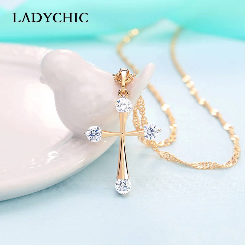 

LADYCHIC Simple Cubic Zirconia Gold Color Cross Pendant Fashion Cute Cross Necklace Women Prayer Christian Jesus Jewelry LN1073