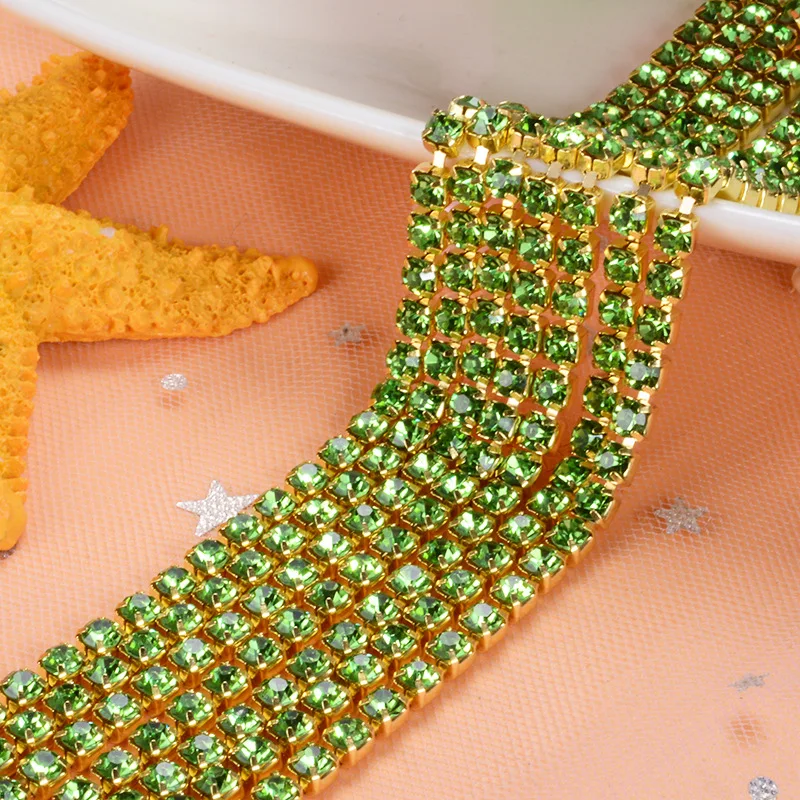 5yard/piece SS6 SS8 SS12 Light green Glass Crystal sew on rhinestones Chain gold bottom Diy Clothing accessories SIJISHUIZUAN