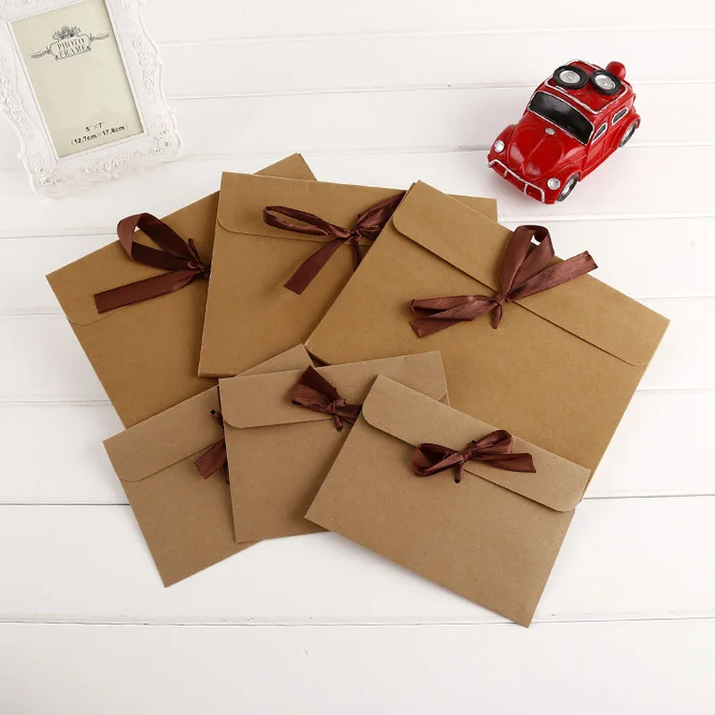 

100pcs S L Kraft Paper Pocket Bag Kerchief Handkerchief Silk Scarf Packing Boxes Card Gift Envelope Ribbon Box Wholesale ZA3864