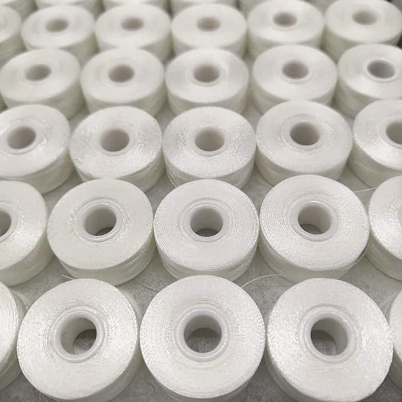 100% polyester sideless embroidery thread 144pcs/box Size L White/ Black 70D/2 sideless prewound bobbins for embroidery