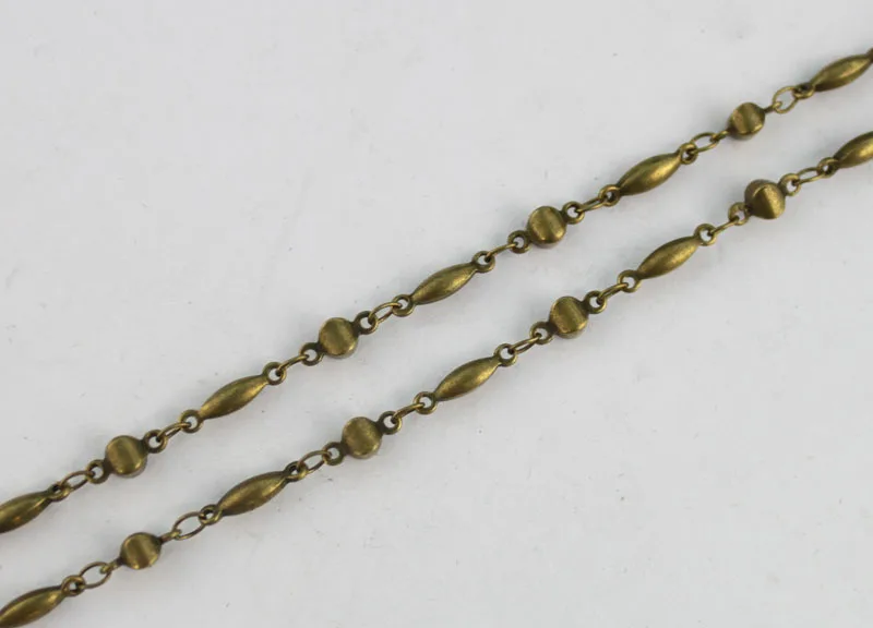 

2 Meters of Antiqued bronze stick and ball link handmade chain #22909