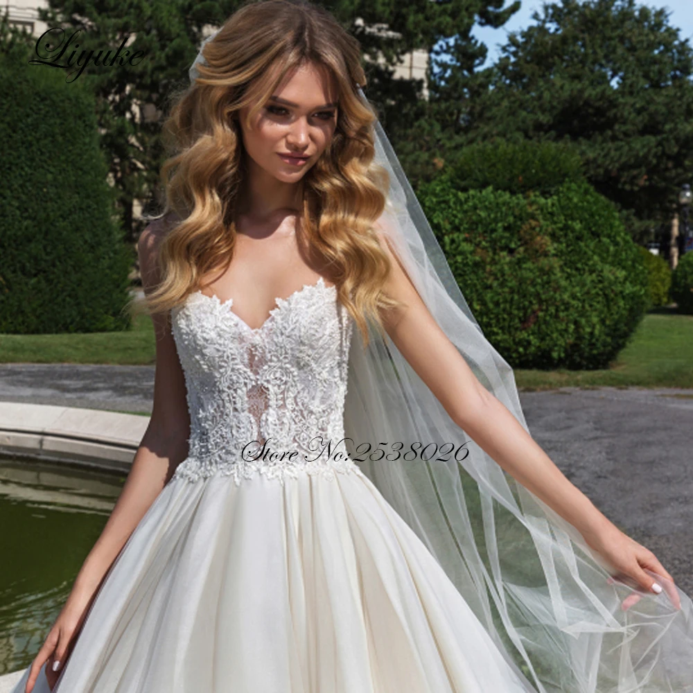 Liyuke Ivory Color Sweetheart Neckline A Line Wedding Dress With Court Train Tulle And Organza Sleeveless Wedding Gown