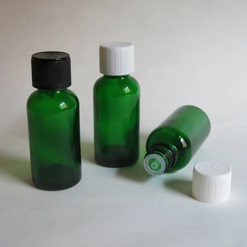 

Wholesale 100pcs 30ml Green Glass Vials Bottle With Cap, emty glass 30ml Essential Oil Bottle for Electronic Cigarette Liquid