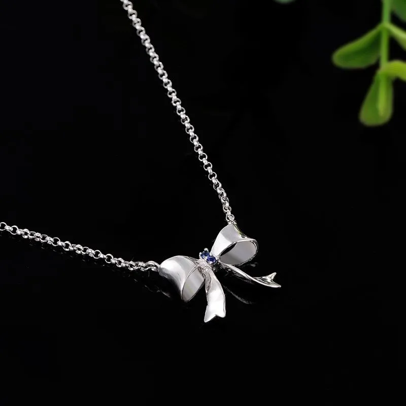 SDA Women's 925 Sterling Silver Bowknot Pendant With Purple Crystal Inlaid