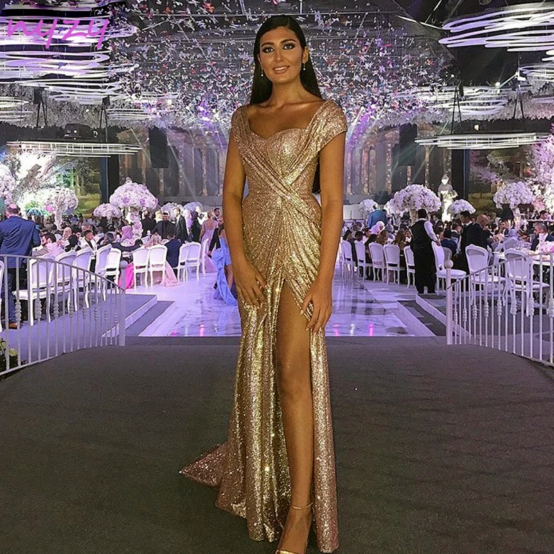 Nyzy e7 sexy alta perna fenda boné mangas vestido de lantejoulas ouro vestido formal robe longue sereia longo vestido de noite 2019