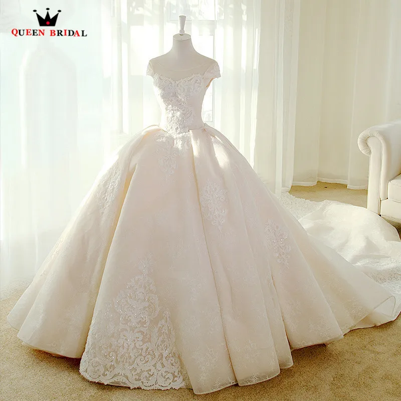 

Custom Made Ball Gown Fluffy Big Train Lace Beading Crystal Luxury Wedding Dresses 2023 Real Photos Bridal Wedding Gown YB128