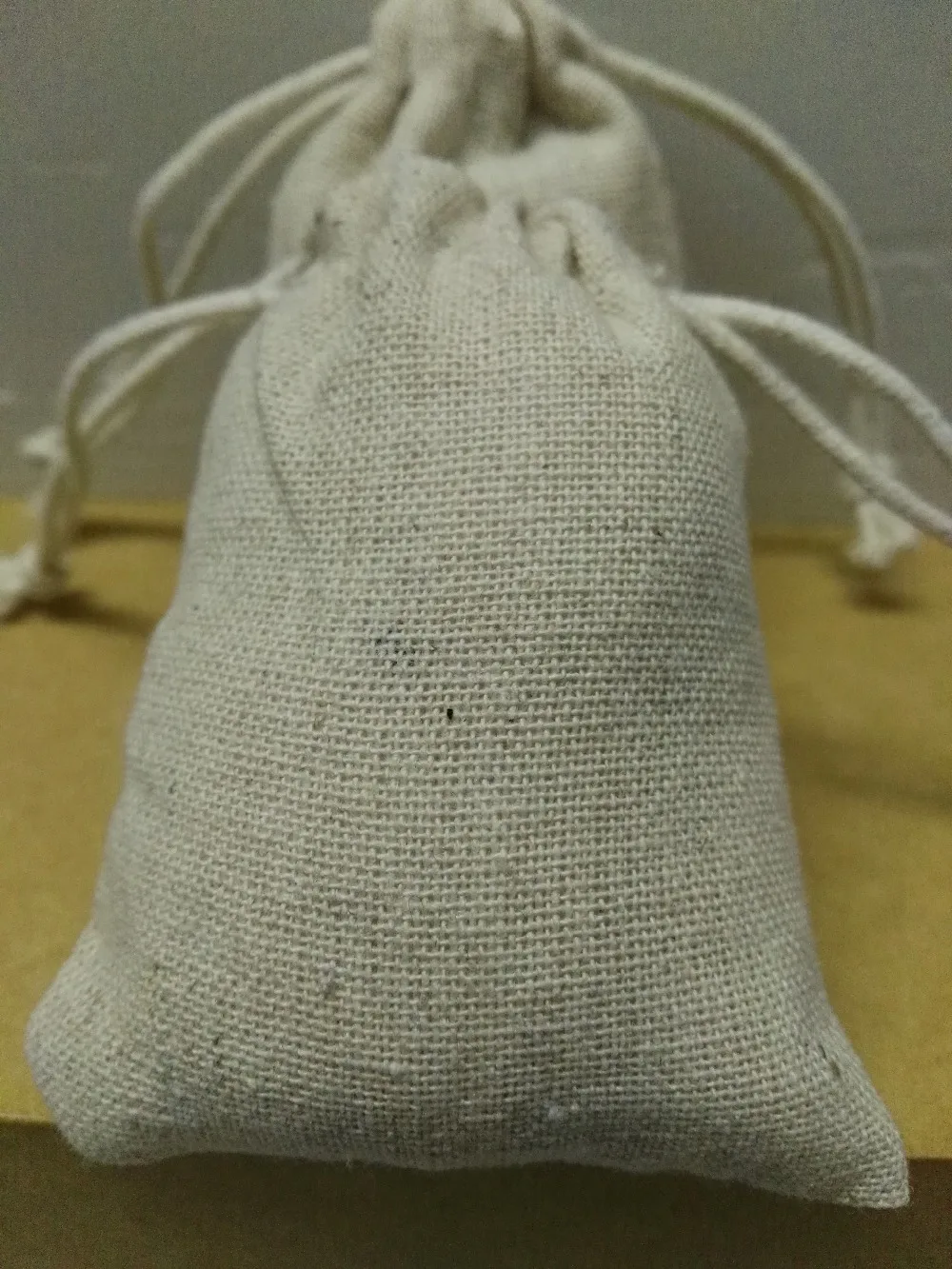 

free shipping 50pcs/lot 12*15cm overlocked linen jewelry bag small drawstring bag gift pouch for nacklace coffee Packaging