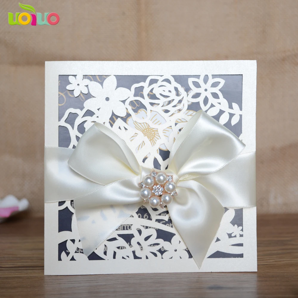 

DIY 25set customize inc129 laser cut wedding invitation card flower cream,tied bow ,big rhinestone,printing card,envelope seal