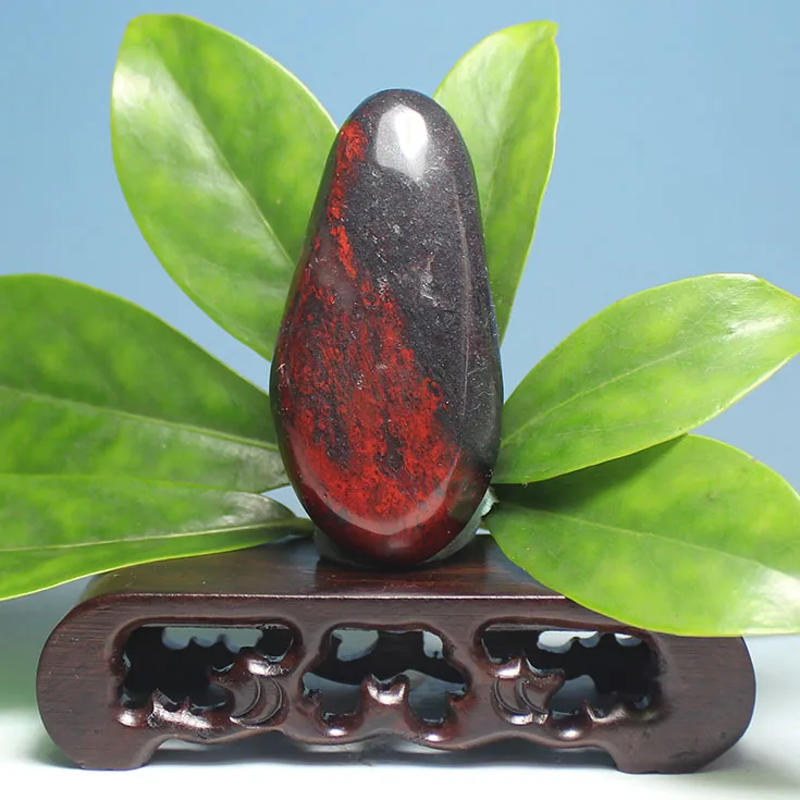 

Yu Guilin chicken to red jasper natural jade hand pieces playing pieces black red stone lucky stone hand pieces