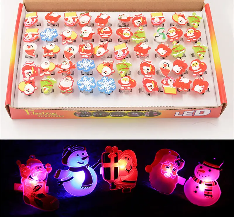 

[Funny] 50pcs/lot Flashing LED Light Up Toys Christmas Santa Claus Christmas tree Snowflakes Snowmen Ring toy kids girl gift