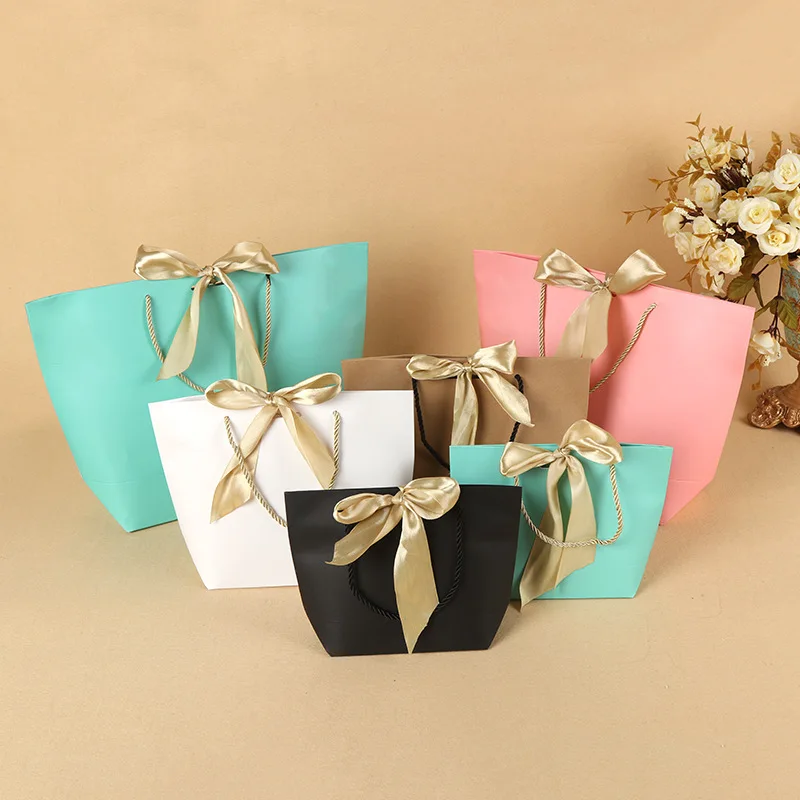 

250pcs Kraft Paper Present Box For Pajamas Clothes Books Packaging Gold Handle Paper Box Bags Kraft Paper Gift Bag With Handles