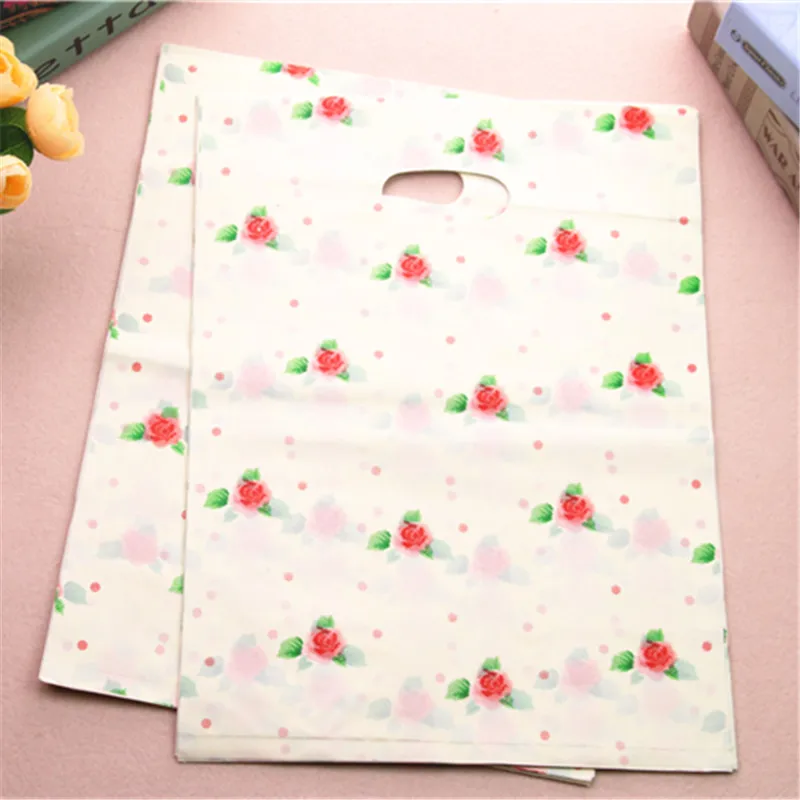  New Design Wholesale 100pcs/lot 30*40cm Large Shopping Package Bags With Flowers Plastic Clothing Packaging Bags