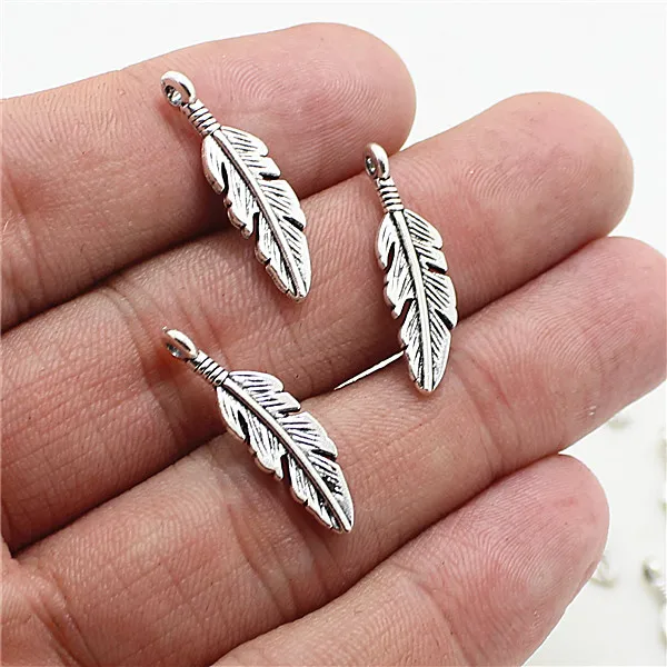 

Sweet Bell Free Shipping 100pcs 6*24mm Feather Charms Antique Tone feather pendants charms 2D254