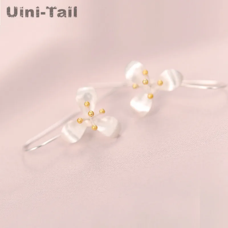 Uini-Tail hot new 925 Tibetan silver Thai craft clover gold flower earrings fashion tide flow high quality earrings GN953