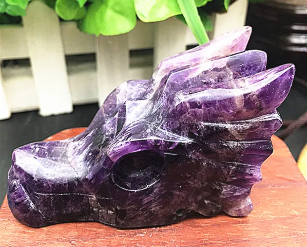 

Hand-carved natural fantasy purple dragon head bone