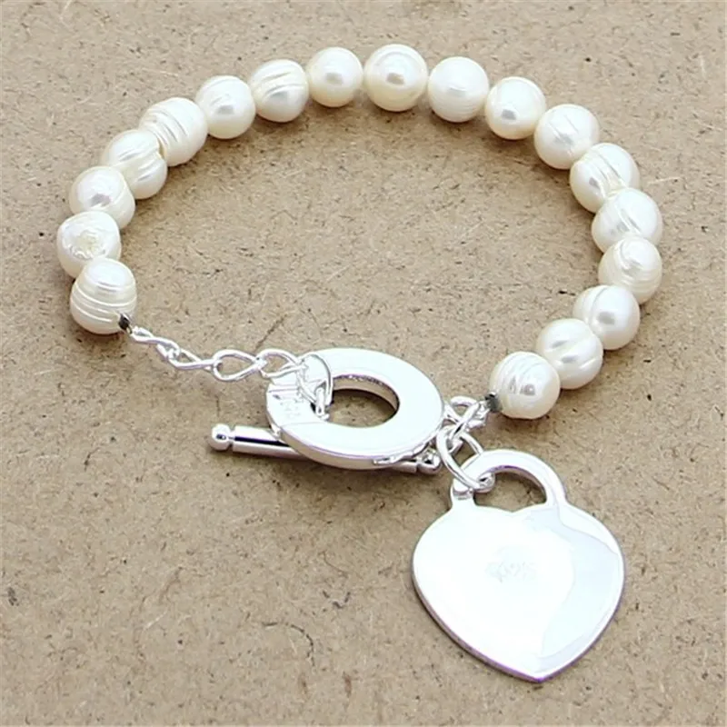 

Hot Sale 925 Sterling Silver Freshwater Pearl Charm Bracelet with Heart Pendant Bracelet For Women Men 5 Color