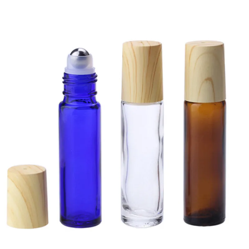 

10ml Mini Amber Clear Blue Green Glass Roll On Bottle 10cc Sample Vials with Metal Ball Plastic Imitation Wood Lids