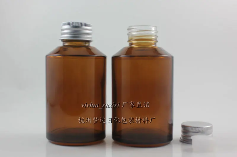 

125ml amber/brown Glass bottle With silver aluminum screw cap and reducer.for Essential Oil/liquid cream/lotion,glass Container