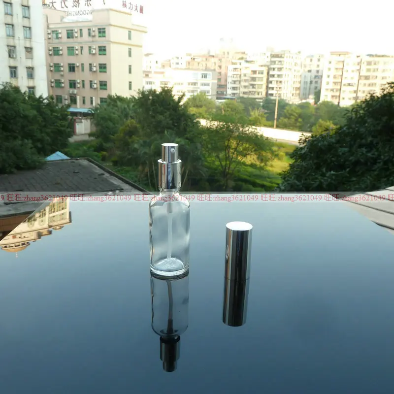 

50ml clear Glass lotion Bottle With aluminum shiny silver pump.for lotion and essential oil. lotion container