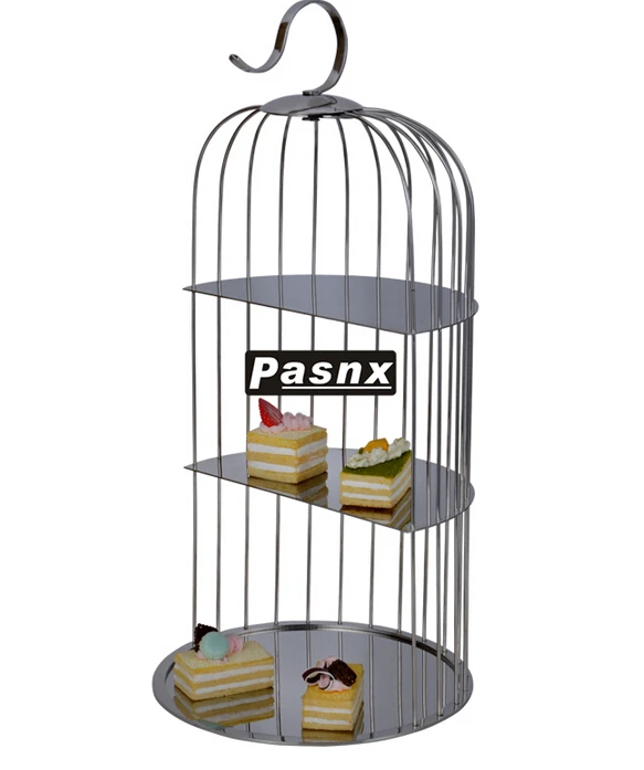 Stainless steel cage snacks display. Three layer cake. Creative compote afternoon tea heart