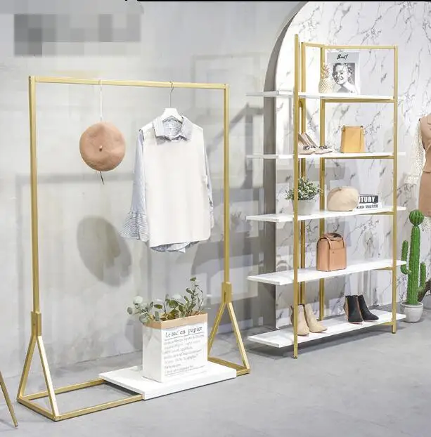 Clothing display rack gold wrought iron floor bag shelf rack women's clothing store side jewelry rack white shoe rack.