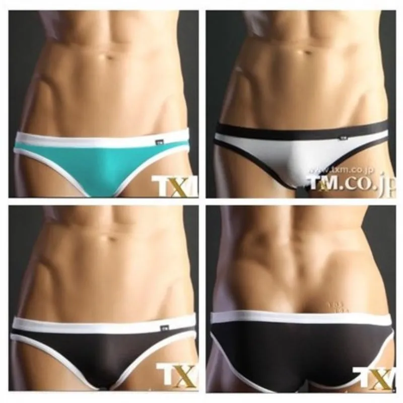 New TM Mens Jockstrap Jock Straps Thongs G Strings Popular Brand Sexy Mens Underwear Gay Fashion Design Penis Pouch