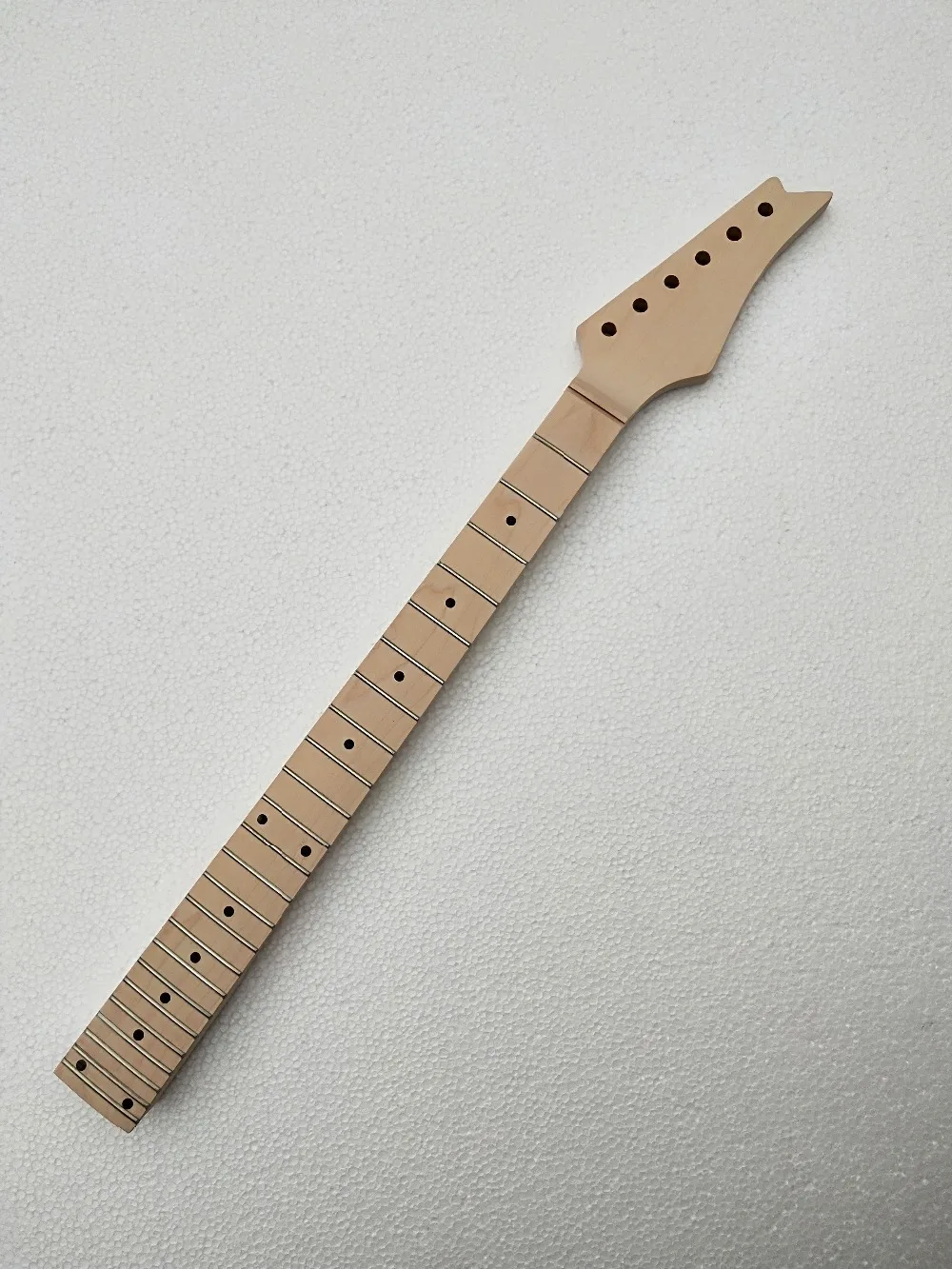 

one 24 fret 25.5 inch unfinished electric neck maple made and maple fingerboard black dot inlay ibanez neck