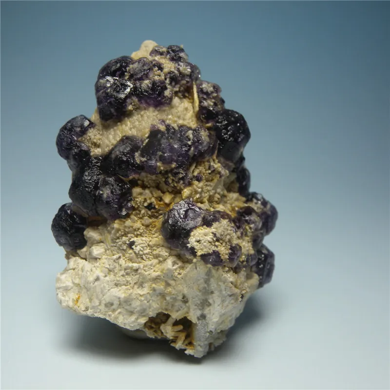 

Mineral fluorite purplish fine spherical inclusions of quartz mineral ore samples symbiotic natural stones