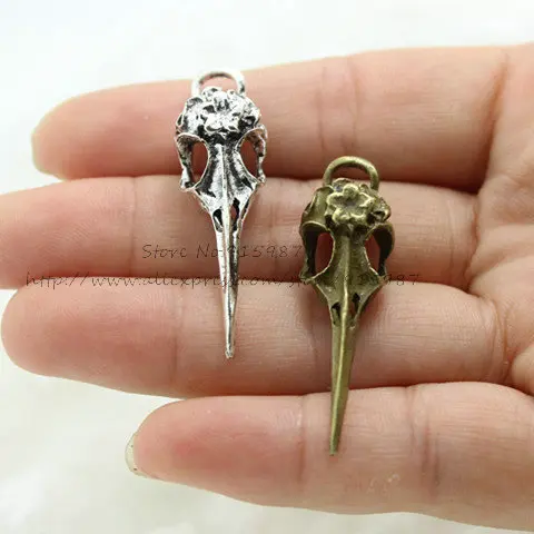 

Sweet Bell 20pcs/lot 10*12*41mm Hand Made Vintage Zinc Alloy 3D Skull Birdhead Charms Fit Jewelry Making Charms D0919