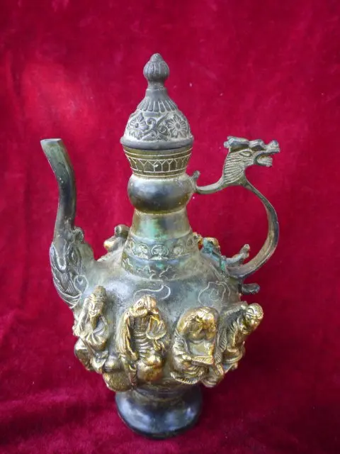 

Very rare Ming Dynasty (xuan de1426-1438) Bronze teapot,8 fairy