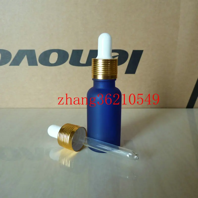 

20ml blue frosted Glass Essential Oil Bottle With aluminum shiny gold dropper cap. Oil vial, Essential Oil Container