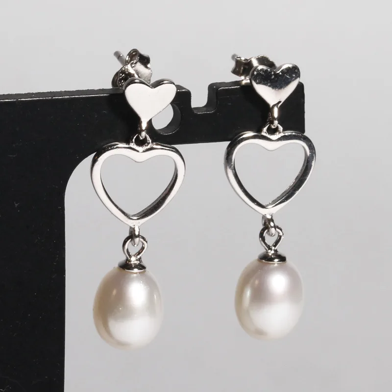 

100%s925 pure silver earrings Natural pearls earrings Fashion cool wind A undertakes to