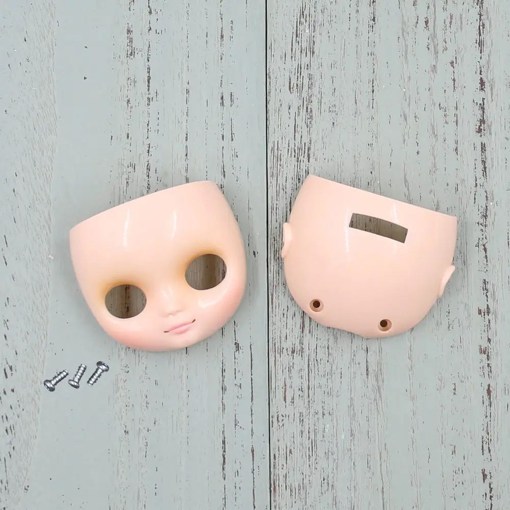 Middie Blyth faceplate with the Back of the Surface Shell and Screw White Skin matte shell and glossy shell