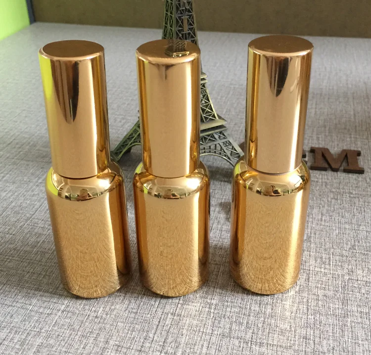 

50pieces 30ml gold UV coating refillable empty atomiser, 1 ounce spray perfume bottle, 30ml shiny gold perfume glass bottle