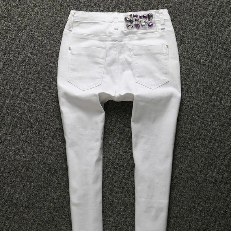 New Embroidered Flares Jeans Woman Fashionable White Hole Ripped Stretch Pencil Pants Diamond Casual Denim Trouser Female