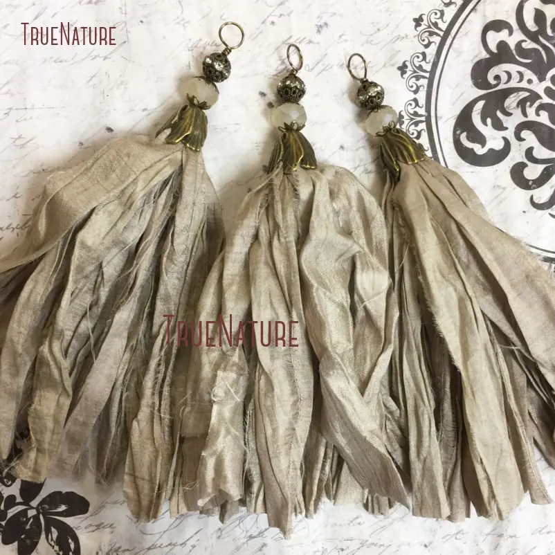 

Wholesale Design Taupe Beige Sari Silk Bohemian Style Tassel Pendant Antique Brass Flower Bead Cap Handmade Jewelry PM14465