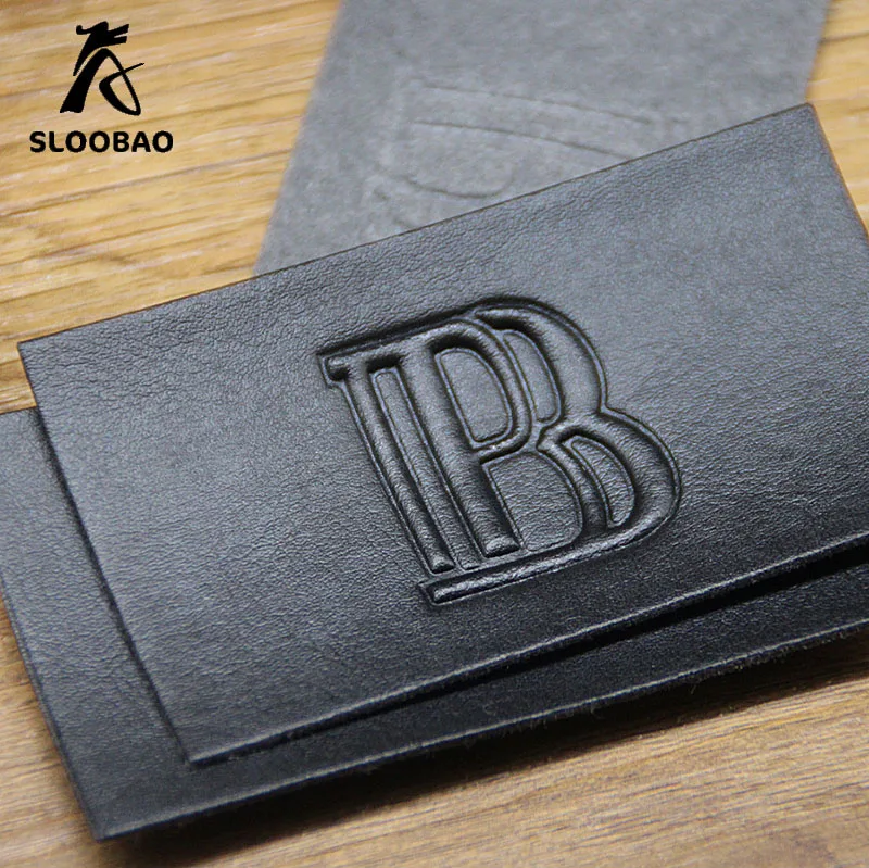 custom leather labels for jeans, bags, shoes in high quality, real leather/genuine label, debossed/engraved logo
