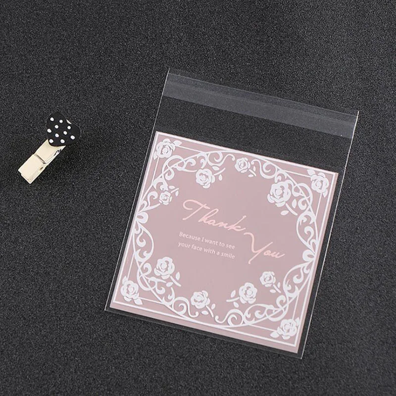 100 Pcs Pink Self adhesive OPP Plastic Candy Cookie Baking Bag, White Roses Printed Handmade Soap Jewelry Packaging Bag