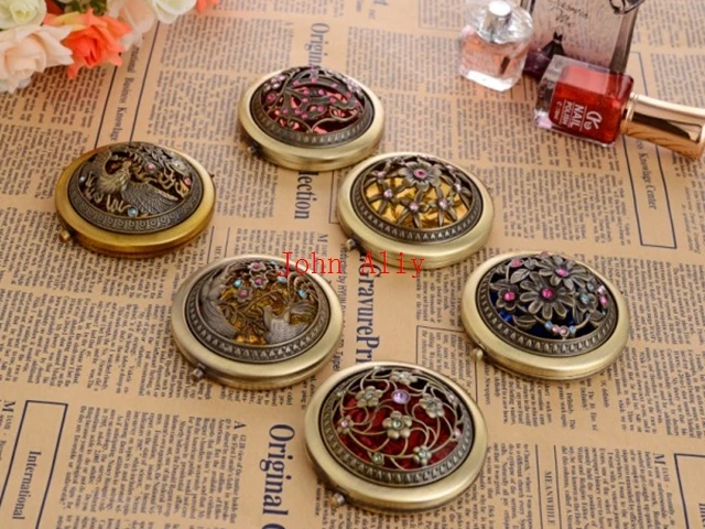 

Wholesale Ancient bronze hollow out double folding portable metal Engraved Crystal Make Up Mirror Wedding gifts