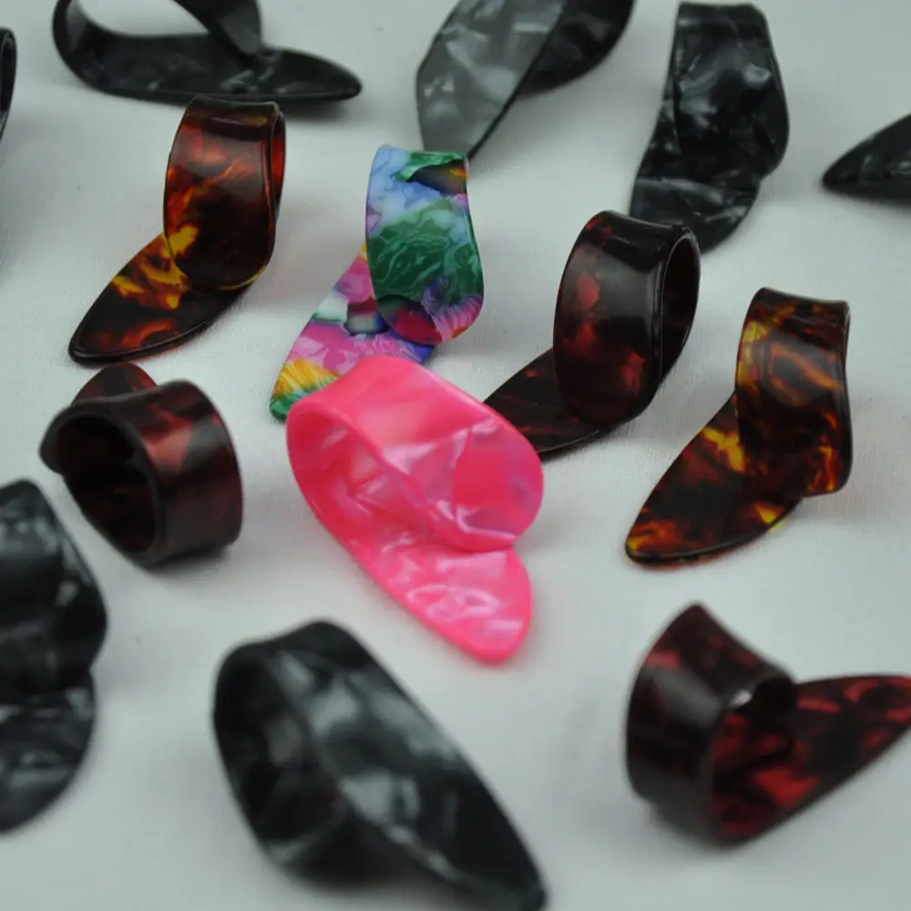 

Lots of 20pcs Celluloid Thumb Guitar Picks Plectrums Ring Shape Assorted Colors