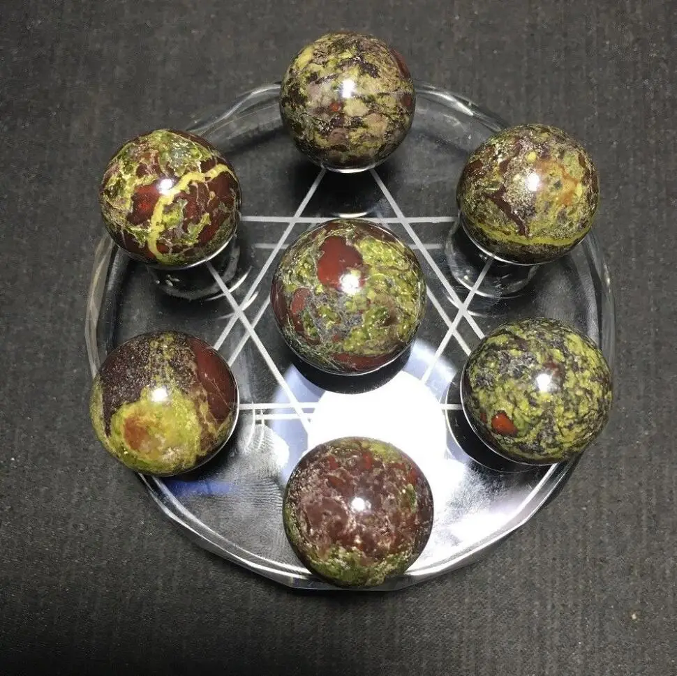 

Natural dragon blood stone ball with plate quartz crystal Seven star array