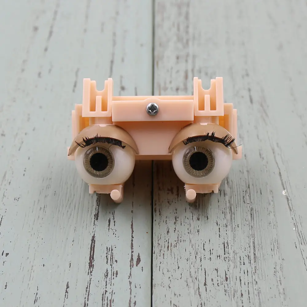 Middie Blyth faceplate with the Back of the Surface Shell and Screw White Skin matte shell and glossy shell