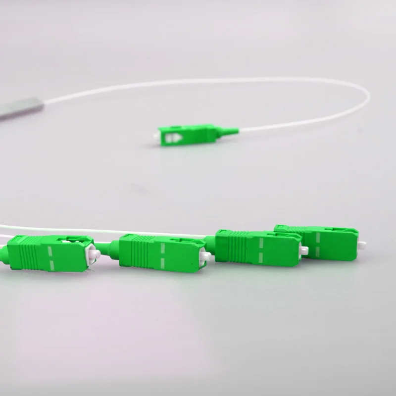 10 قطعة مقسم الألياف البصرية 1 : 4 SC APC أنبوب فولاذي صغير نوع PLC 1x4 مقسم بصري 1-4 CATV FTTH مصنع OEM